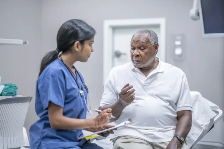JJ_Senior-male-patient-speaking-with-doctor-scaled.jpg